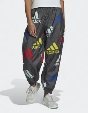ADIDAS PANTALóN ESSENTIALS MULTICOLORED LOGO LOOSE FIT WOVEN