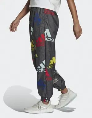 ADIDAS PANTALóN ESSENTIALS MULTICOLORED LOGO LOOSE FIT WOVEN
