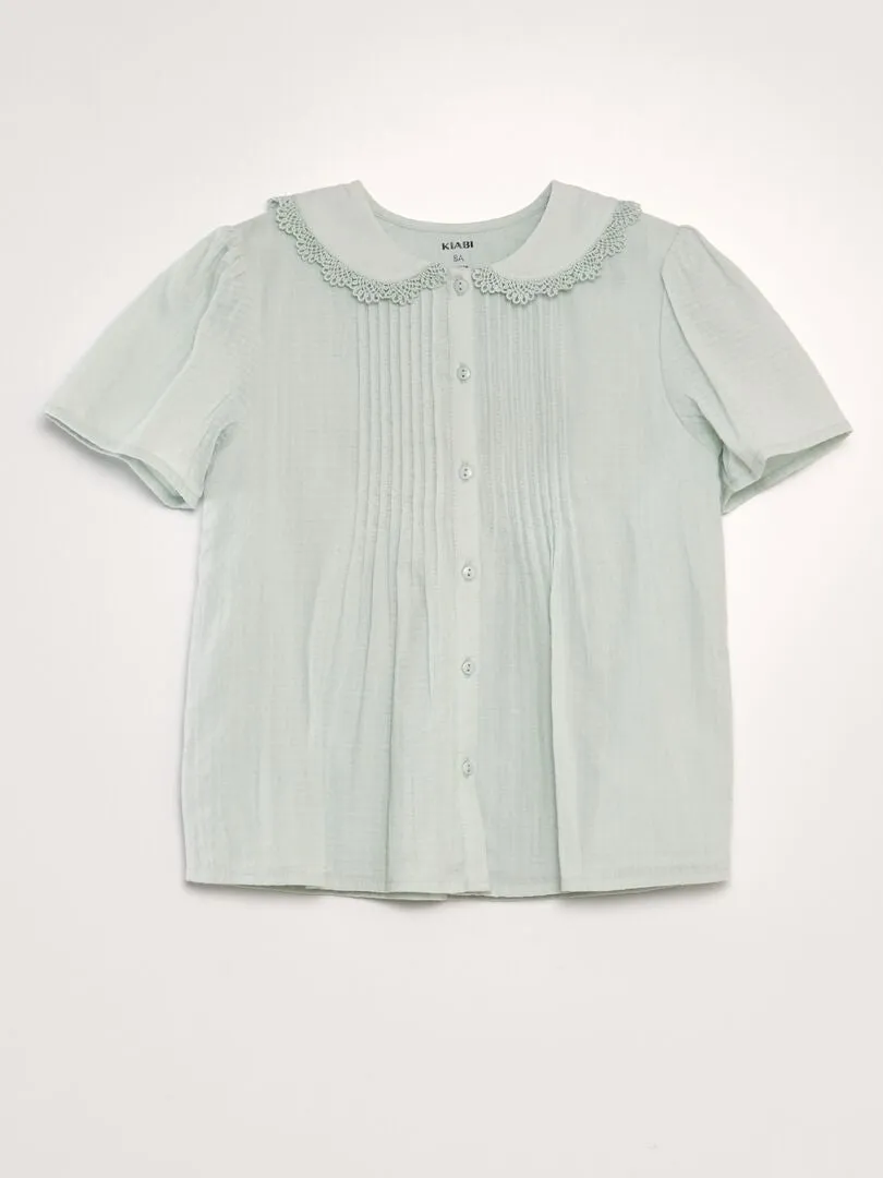 BLUSA CON CUELLO BEBé DE TEJIDO TEXTURIZADO  AZUL