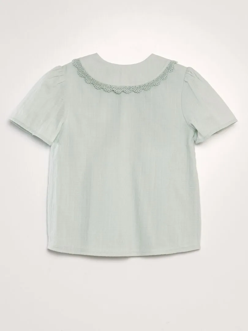 BLUSA CON CUELLO BEBé DE TEJIDO TEXTURIZADO  AZUL