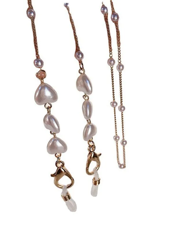 Cadena de anteojos con perla de imitación con patrón de corazón