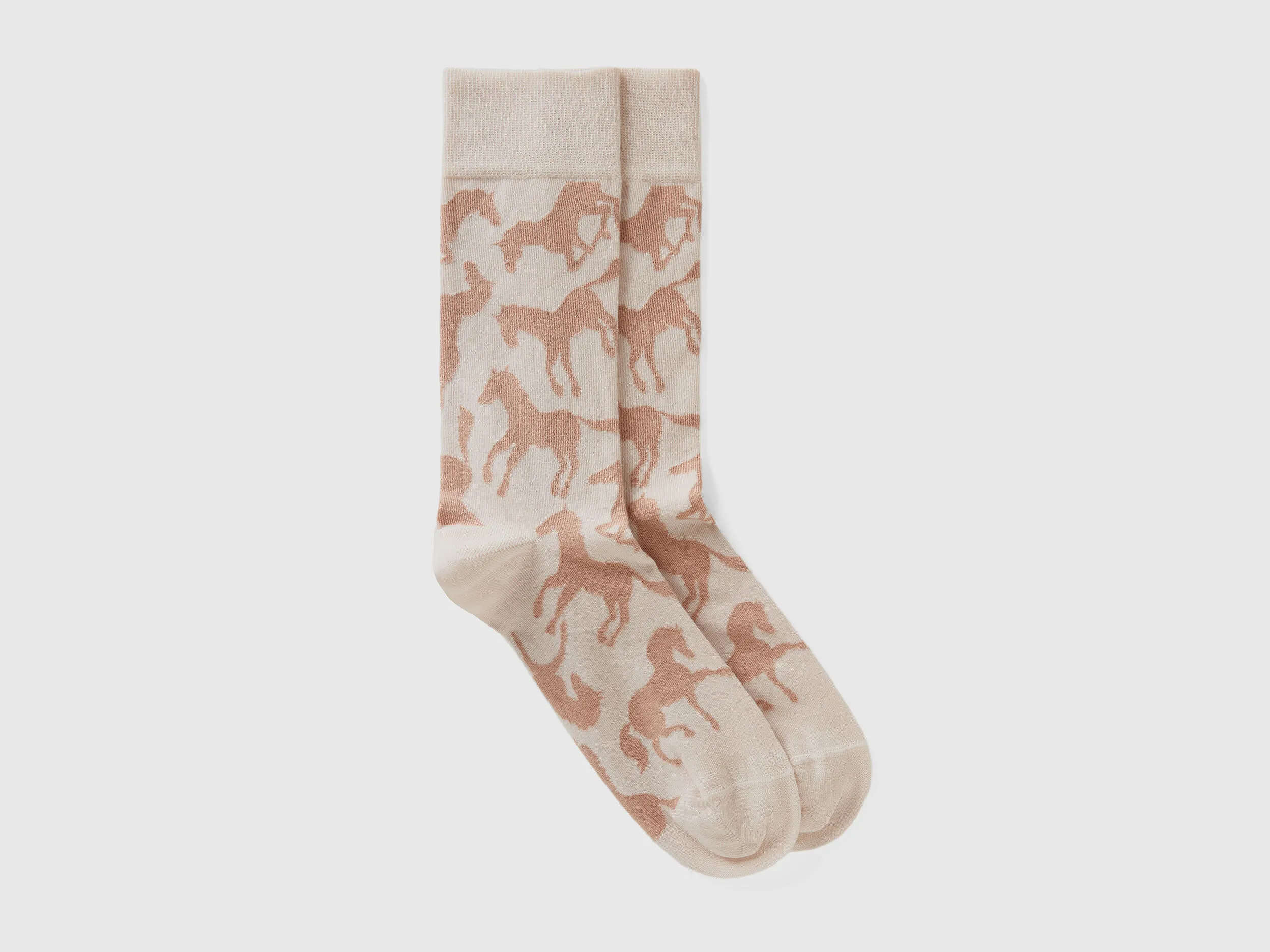 Calcetines largos rosas con caballos