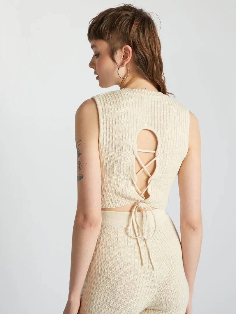 CHALECO CON LAZADA TRASERA  BEIGE