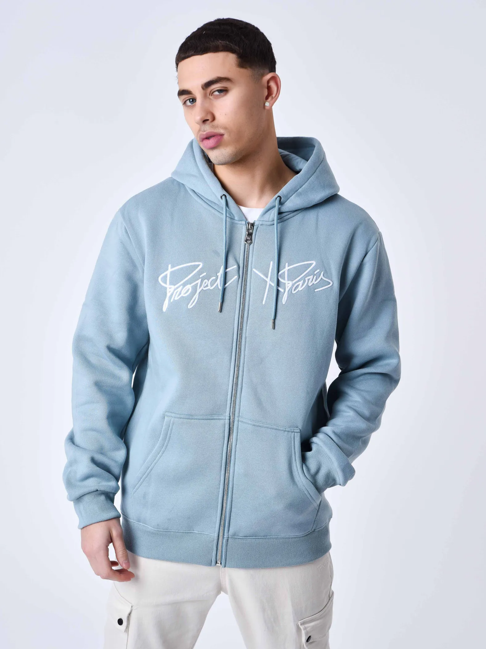 Chaqueta con cremallera y capucha Origin con bordado
