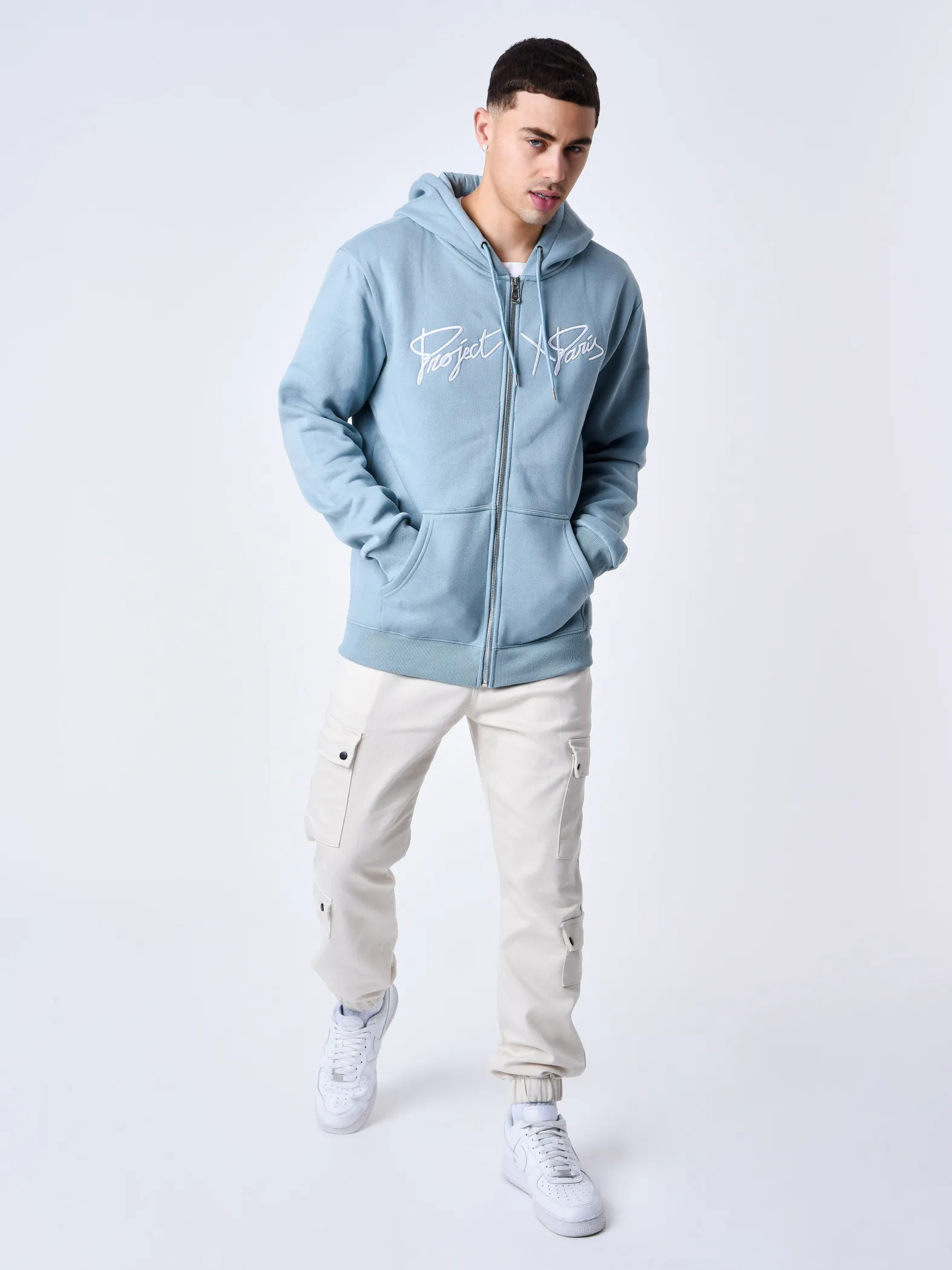 Chaqueta con cremallera y capucha Origin con bordado