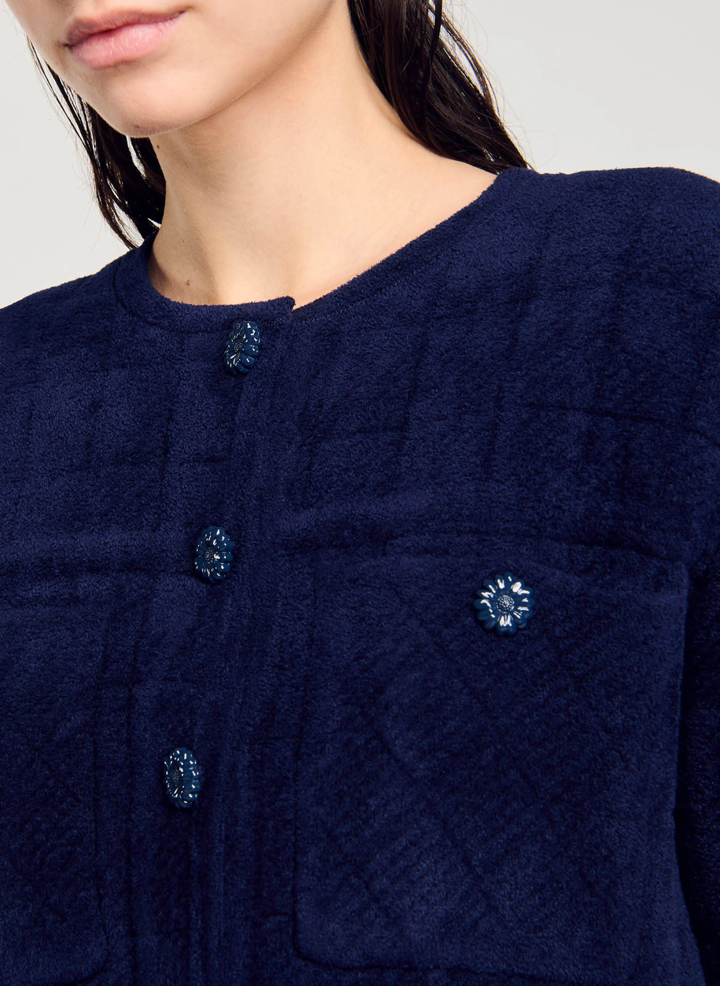Chaqueta recta de punto con cuello redondo. en azul