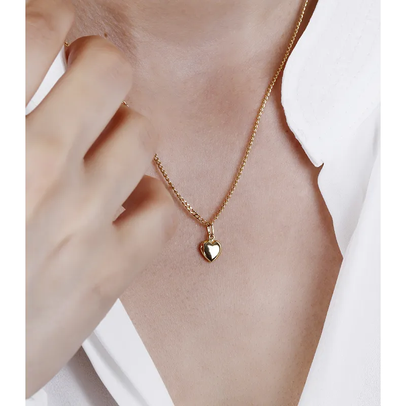 COLGANTE "AHFIR" CORAZÓN ORO 18K