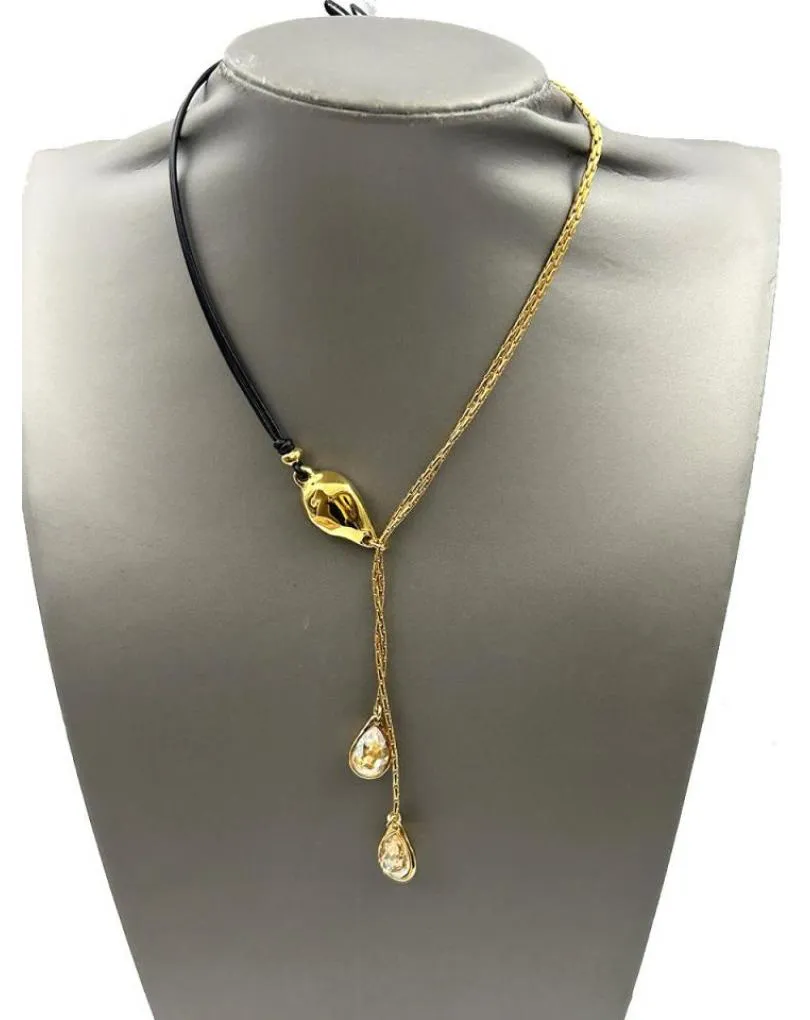COLLARES DORADOS CON BAÑO ORO Y CUERO DISEÑO ASIMETRICO