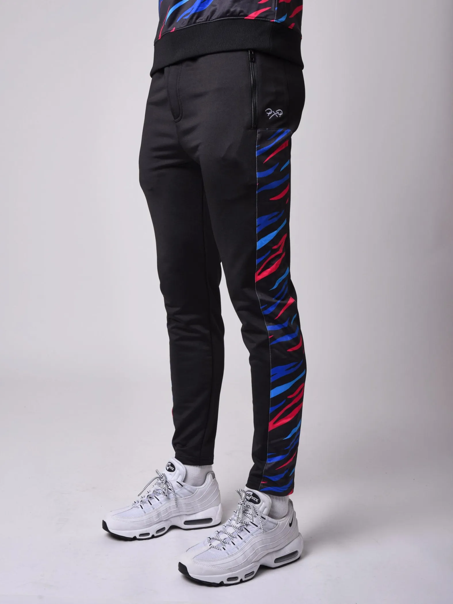 Pantalón de chándal con canesú lateral con motivos de sabana