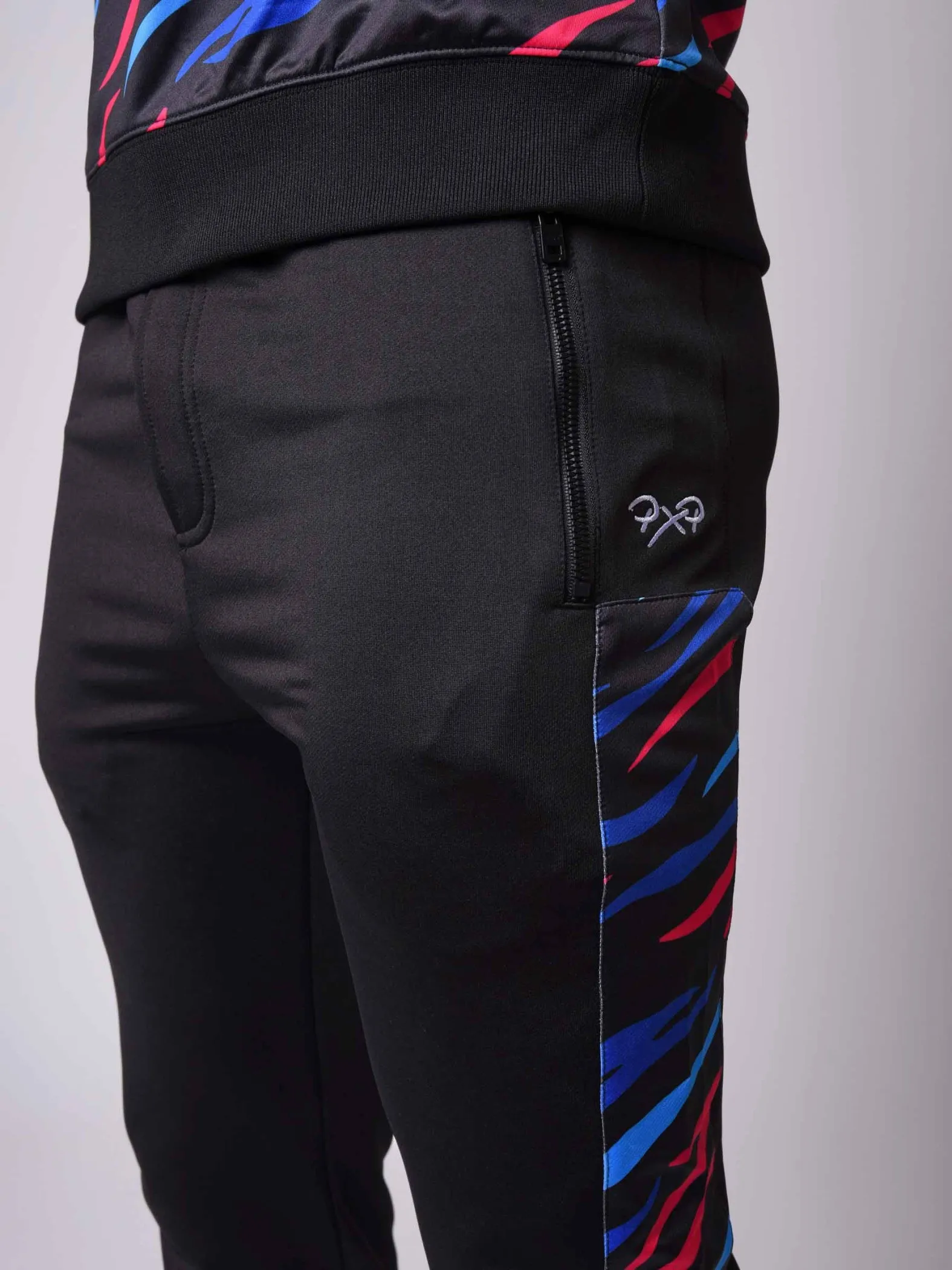 Pantalón de chándal con canesú lateral con motivos de sabana