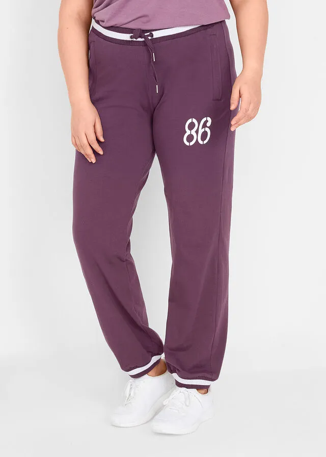 Pantalón deportivo con bolsillos con cierre morado intenso