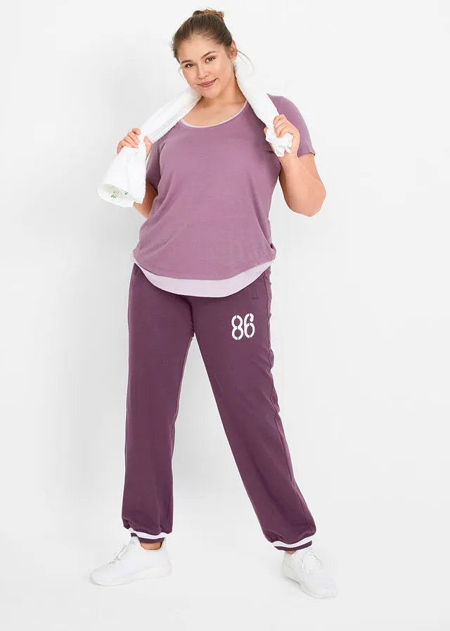 Pantalón deportivo con bolsillos con cierre morado intenso