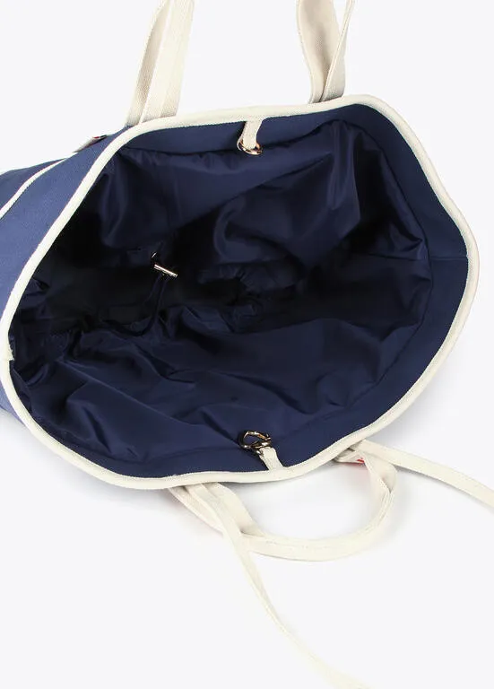 SHOPPER CANVAS CON ASAS DE CONTRASTE LOGOTIPADAS AZULCRUDO LOLA CASADEMUNT