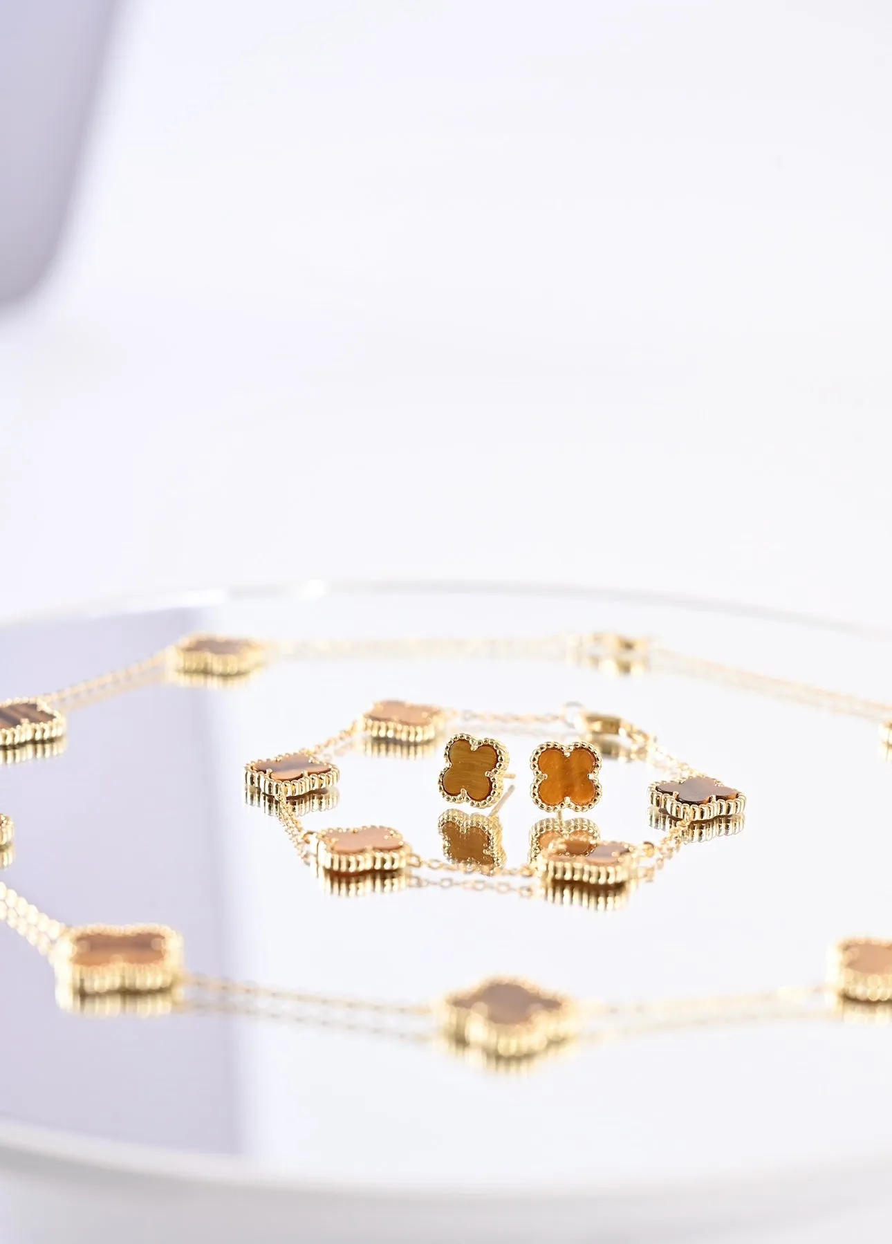 SOLO Aretes marrón colección TRBOL