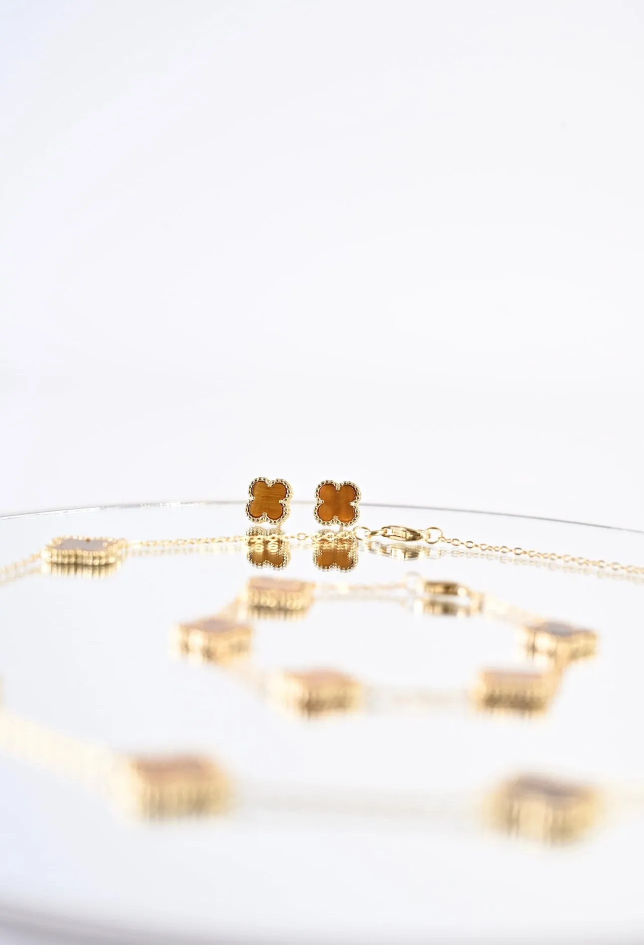 SOLO Aretes marrón colección TRBOL