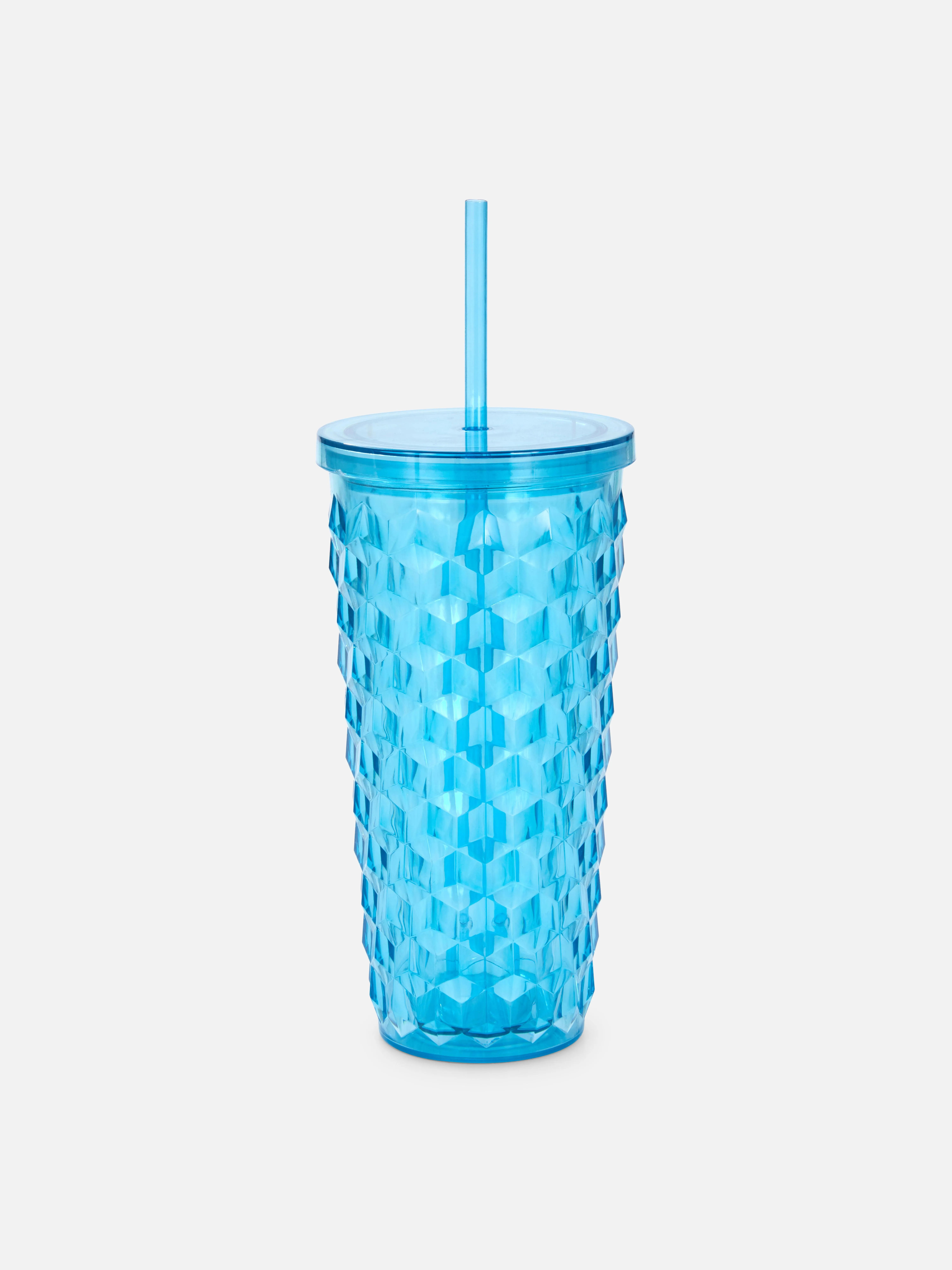 Taza con diseño en relieve y pajita