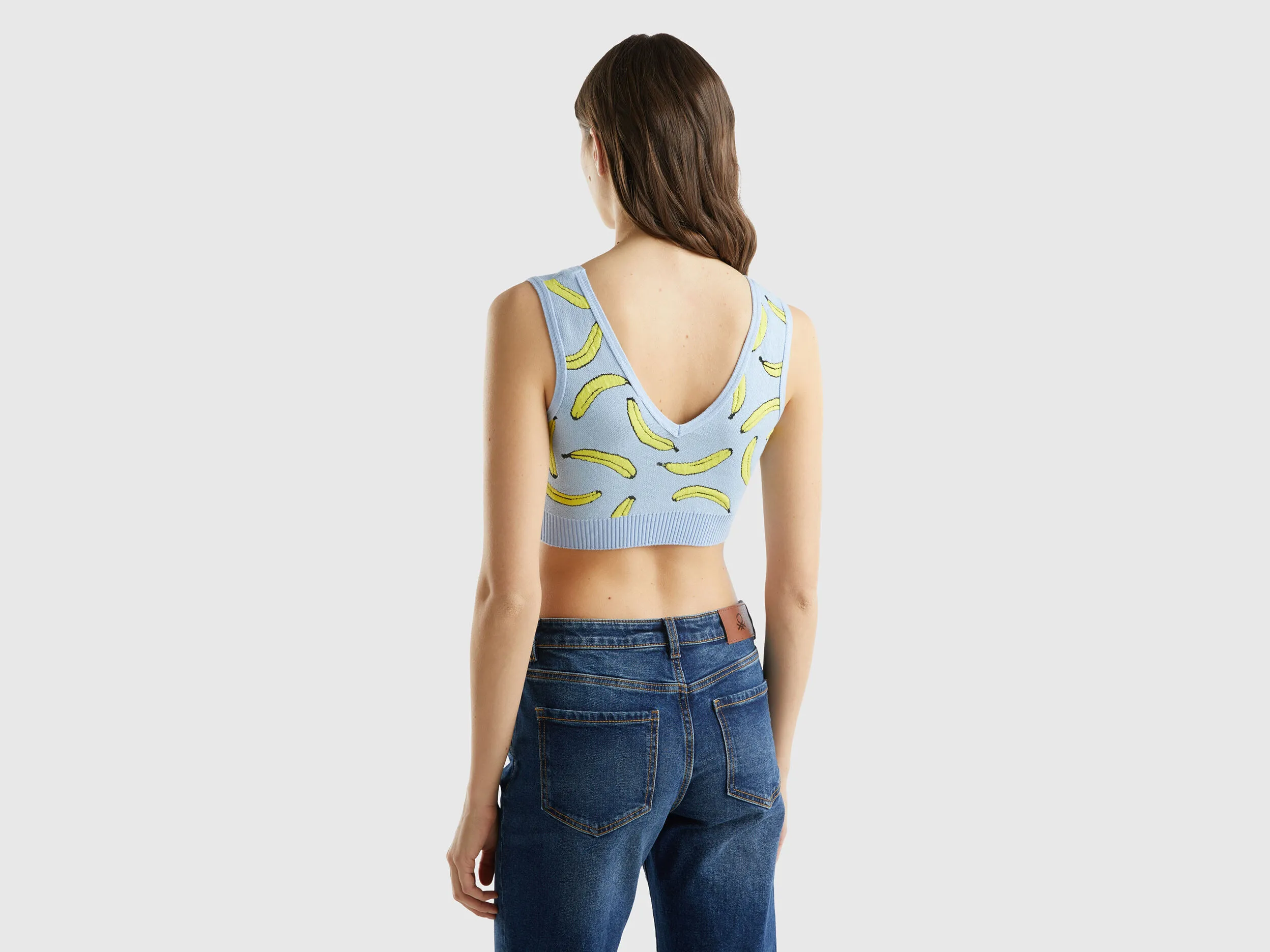 Top bra celeste con estampado de plátanos