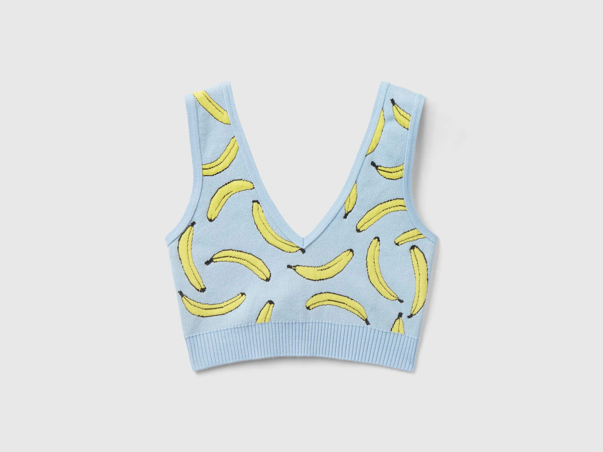 Top bra celeste con estampado de plátanos