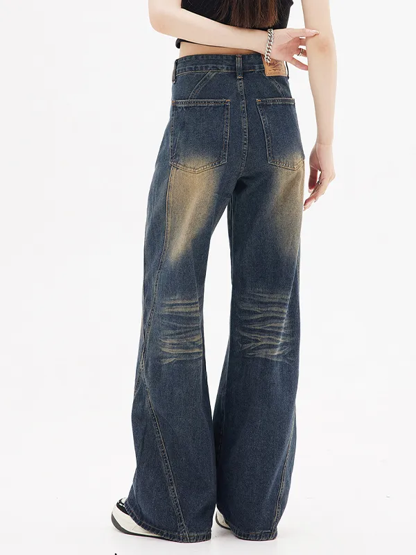 Vaqueros boyfriend lavados en azul oscuro con diseño
