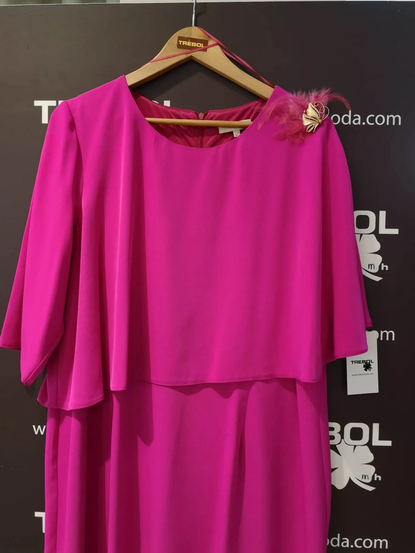 Vestido con cuerpo de capa
