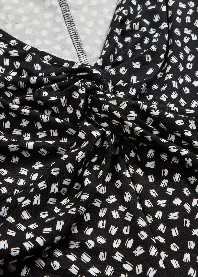 VESTIDO DE PUNTO ESTAMPADO CON DRAPEADO NEGROBLANCO CON ESTAMPADO GRáFICO